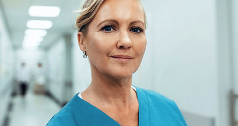 Confident female nurse looking at camera.